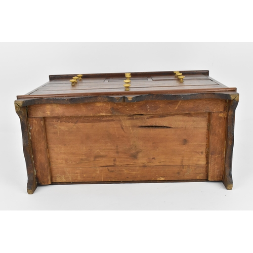 185 - A Regency period mahogany apprentice chest of drawers, with moulded top above two sets of three shor... 