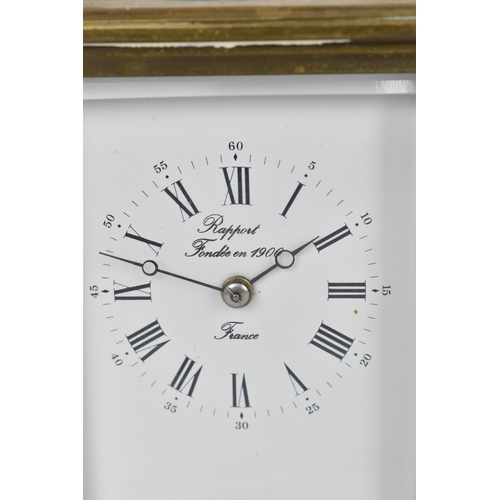 58 - An early/mid 20th century brass cased carriage clock, white enamel dial signed 'Rapport Fondee en 19... 