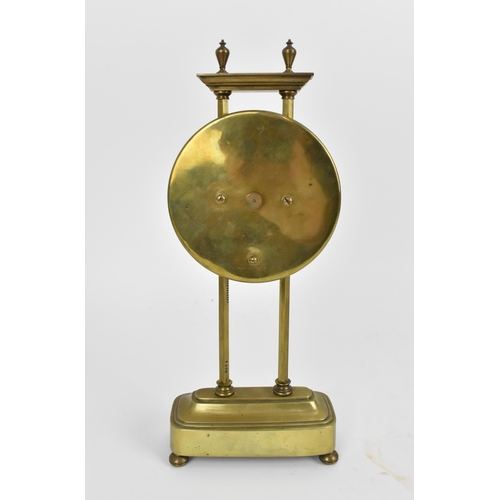 63 - A late 19th/early 20th century brass cased gravity clock having a visual escapement, the Arabic nume... 