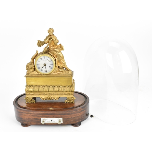 65 - A 19th century French rare musical figural mantle clock, the gilt metal case in the form a female ho... 