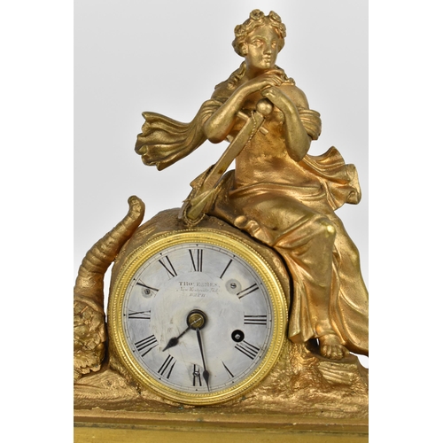 65 - A 19th century French rare musical figural mantle clock, the gilt metal case in the form a female ho... 