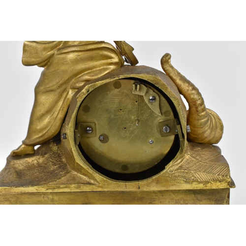 65 - A 19th century French rare musical figural mantle clock, the gilt metal case in the form a female ho... 