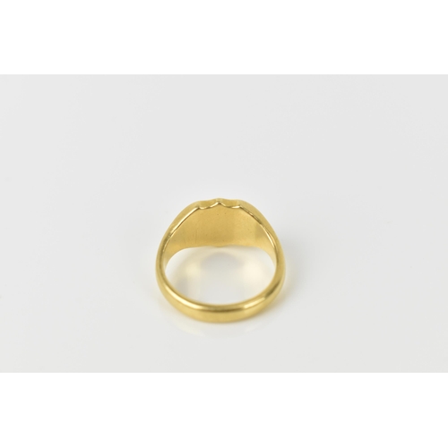 118 - An 18ct yellow gold engraved signet ring, size F, 4.7 grams Location:CAB4