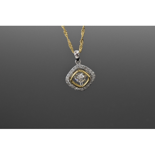 156 - A two tone 14ct gold and diamond pendant, on an Italian 14ct yellow gold Singapore chain, the pendan... 