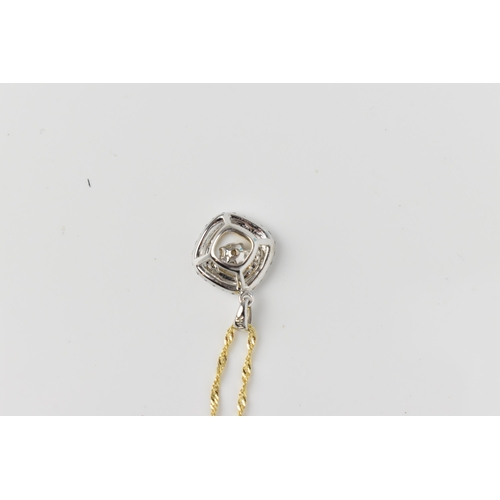 156 - A two tone 14ct gold and diamond pendant, on an Italian 14ct yellow gold Singapore chain, the pendan... 