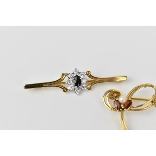 160 - A 9ct yellow gold, cubic zirconia and dark stone floral brooch, together with a 9ct yellow gold, pea... 