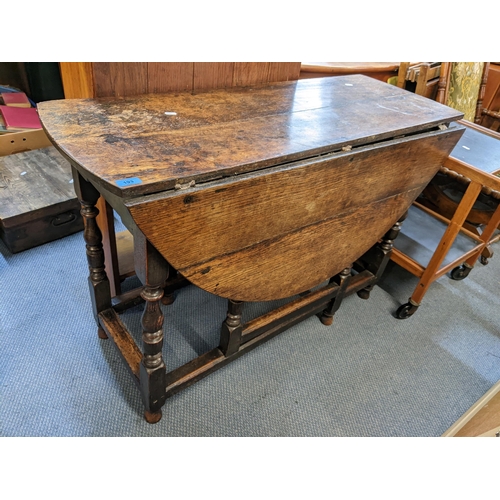 193 - An early 18th century oak gateleg dining table with inset drawer, 75cm h x 113cm w
Location:A2B