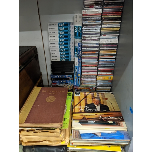 203 - A selection of CD's, DVD's records and sheet music to include sixties music, collections, easy liste... 