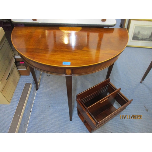 214 - A reproduction inlaid mahogany demi lune side table on square tapering legs and splayed feet with pu... 