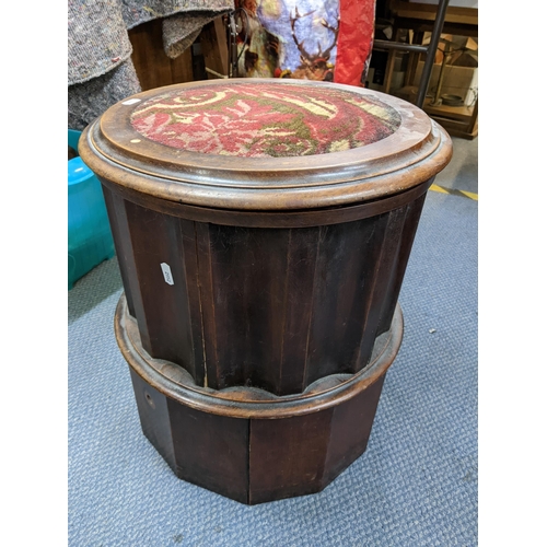 219 - A Victorian mahogany commode of rounded form and having a tapestry top, 46cm h x 41cm w
Location:RWB