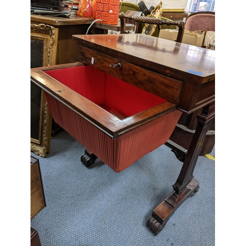 220 - A Victorian mahogany work table having a single drawer with storage below and on scroll shaped feet,... 