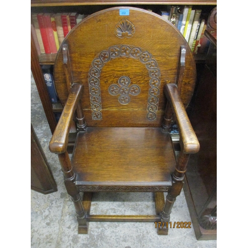 232 - An early 20th century carved oak chair/table combination, the back revolving for use as a table top ... 