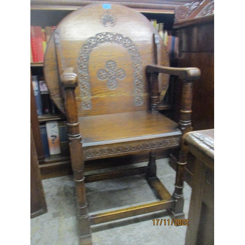 232 - An early 20th century carved oak chair/table combination, the back revolving for use as a table top ... 