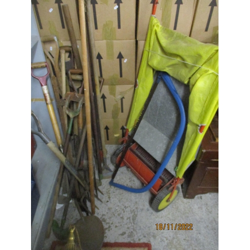 246 - Various garden hand tools to include wooden handles spades, forks, pruner and other items
Location:G