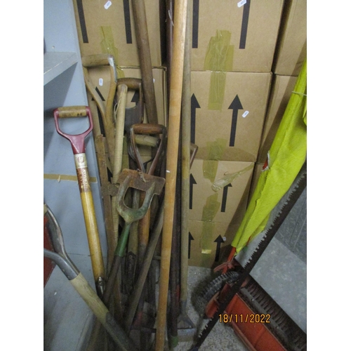 246 - Various garden hand tools to include wooden handles spades, forks, pruner and other items
Location:G