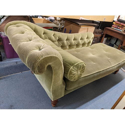 38 - A Victorian green button back upholstered chaise longue and on turned legs, 76cm x 188cm 
Location:L... 