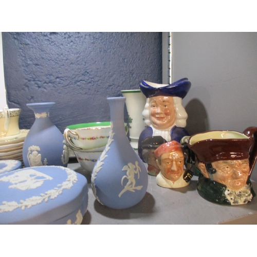 64 - A mixed lot to include Wedgwood blue jasperware, Royal Albert Serana tea cups, character jugs and ot... 