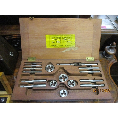 70 - A lot to include a Paquet wooden cased metronome, a set of German chemist scale weights, boxed, and ... 