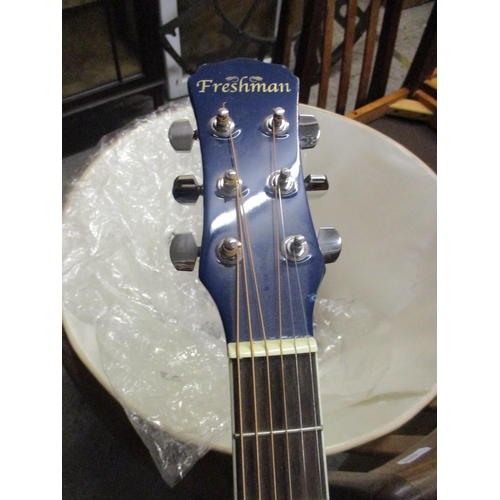 75 - A Frishman FA 100 acoustic guitar in blue colourway, along with a wooden recorder Location:A4M