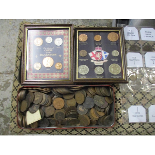 80 - A quantity of British coinage to include framed and glazed sets including a Royal Buckingham collect... 