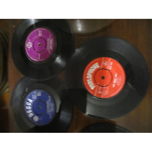 90 - A selection of 1960's 45RPM single records to include Adam Faith, Tommy Steele and Elvis Presley, an... 