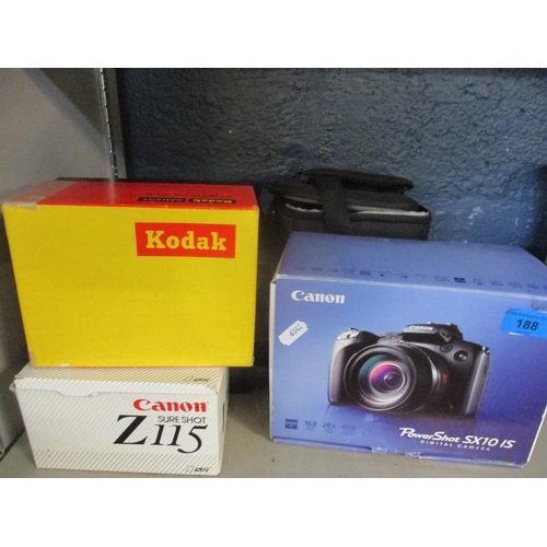 188 - A mixed lot of cameras and a portable radio to include a Canon Powershot SX10is 10.0mpx, a Canon Sur... 