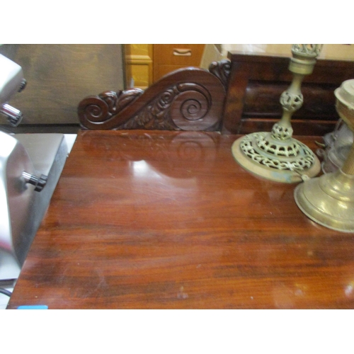 233 - A Regency mahogany twin pedestal serving table, extended back with leaf and scrolled decoration, the... 