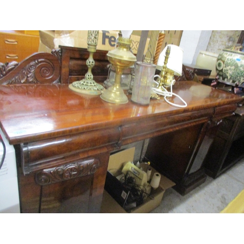 233 - A Regency mahogany twin pedestal serving table, extended back with leaf and scrolled decoration, the... 