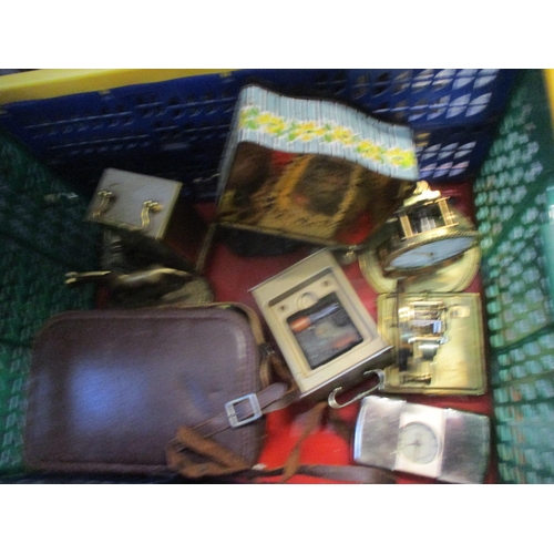 37 - A mixed lot to include walking sticks, mantel clocks, letter rack, cameras to include a Canon A1200,... 