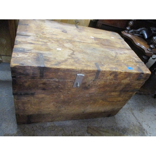 87 - A vintage wooden pine trunk with iron strapwork and carrying handles, and an early 20th century maho... 