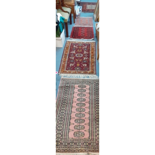 226 - A group of 5 small scatter and prayer mats to include Bokhara examples 
Location: RAB