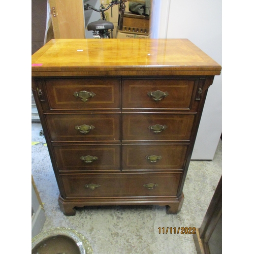 206 - A reproduction mahogany TV cabinet in the form of a gentleman's dressing chest with twin doors in th... 