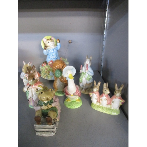 208 - A group of six Beswick and Royal Albert Beatrix Potter figurines to include Mr Jackson, a Border Fin... 