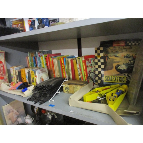 249 - A mixed lot of toys and children's annuals and books to include a Scalextric set, a boxed Barnsbury ... 