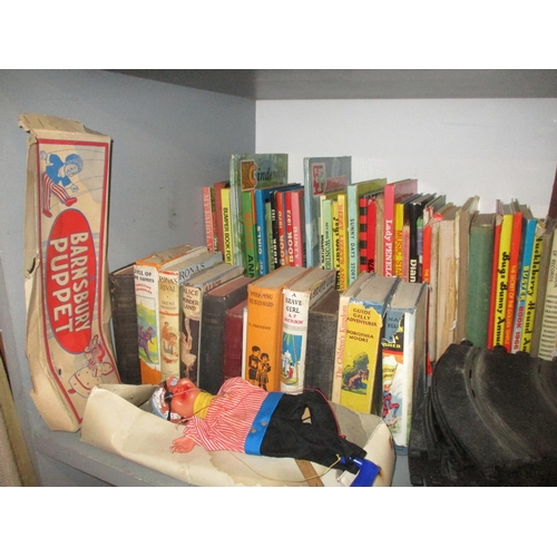 249 - A mixed lot of toys and children's annuals and books to include a Scalextric set, a boxed Barnsbury ... 