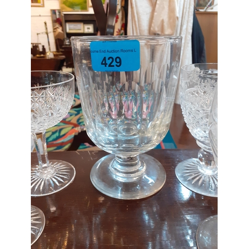 429 - A 19th century rummer and mixed 20th century glassware, mainly champagne saucers, to include Stuart ... 