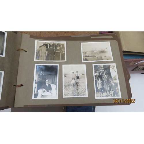 40 - Suitcase with photographs and photograph albums, includes images entered into Haslemere photography ... 