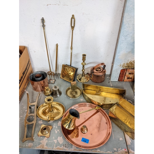 438 - Brass and copper to include a jelly mould, toasting forks, a shoe jack, 18th century candlestick, tr... 