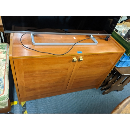 450 - A vintage teak Schreiber two-door music cabinet 62cm h x 92cm w Location:A4M