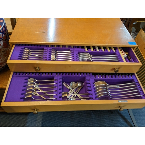 455 - A mid 20th century light oak two-drawer canteen table with Walker & Hall cutlery 
Location:A3F