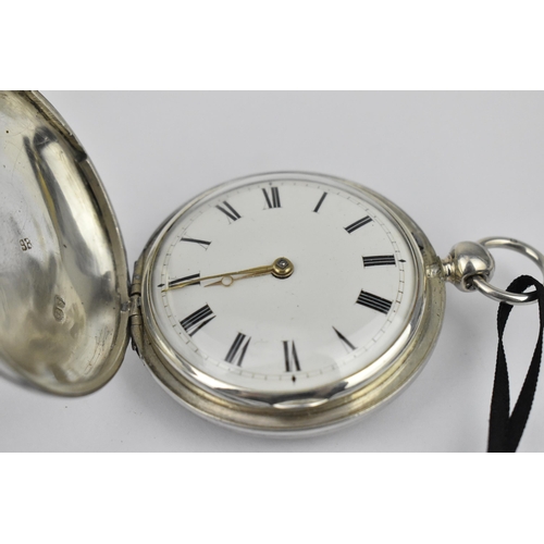 104 - An early 19th century silver full hunter pocket watch having a white enamel dial, with gilt hands, R... 