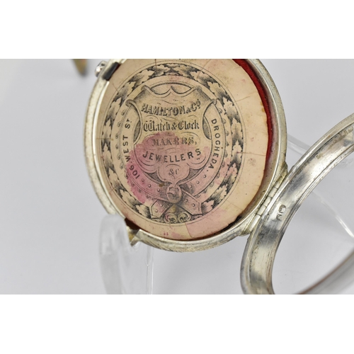 106 - A George III silver pair cased pocket watch having a white enamel dial, silvered hands and Arabic nu... 