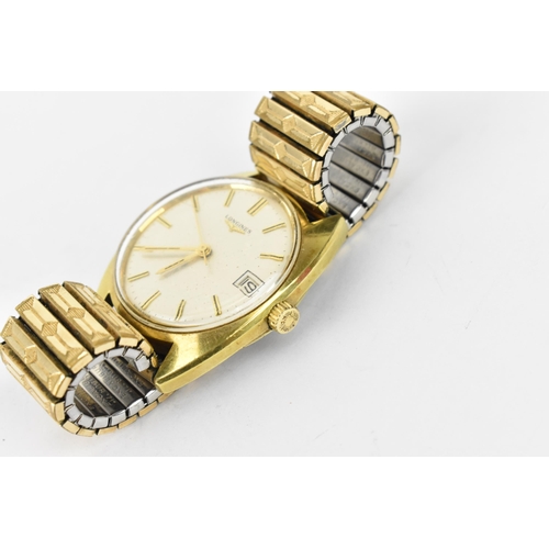 11 - A Longines manual wind, gents, gold plated wristwatch, having a silvered dial with centre seconds, b... 