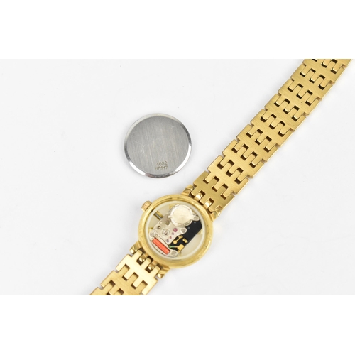 113 - A Rotary quartz, ladies gold plated wristwatch having a white dial with baton markers, gold plated b... 