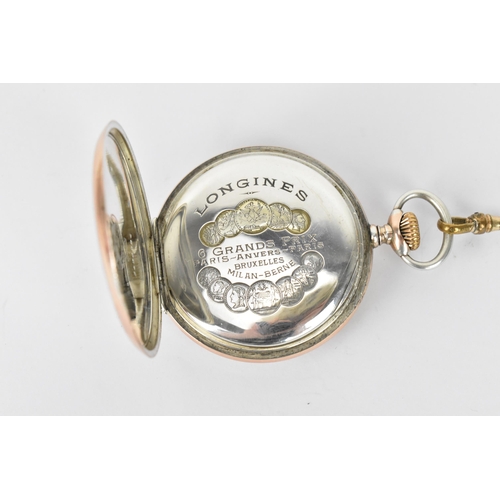 13 - An early 20th century Longines silver cased, open faced pocket watch having a white enamel dial, sig... 