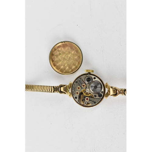 2 - A Vertex manual wind, ladies 9ct gold wristwatch having a white dial with Arabic numerals, 9ct gold ... 