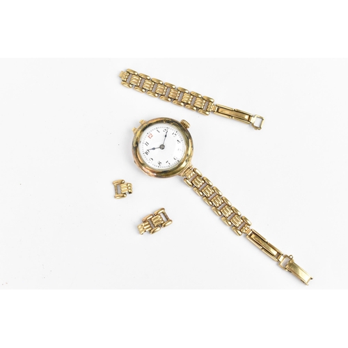 21 - An early 20th century ladies 9ct gold cased manual wind wristwatch having a white enamel dial with A... 