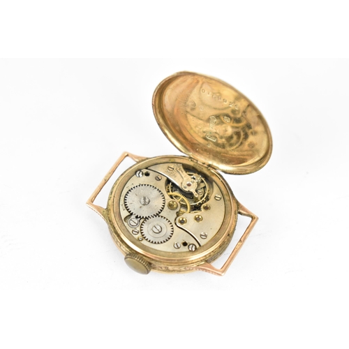 24 - A manual wind, boys size 9ct gold wristwatch having a silvered dial with Roman numerals, blued hands... 