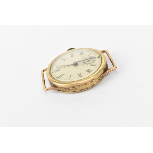 24 - A manual wind, boys size 9ct gold wristwatch having a silvered dial with Roman numerals, blued hands... 