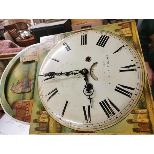 38 - A George III mahogany longcase clock having an arched top with turned finials, twin columns flanking... 